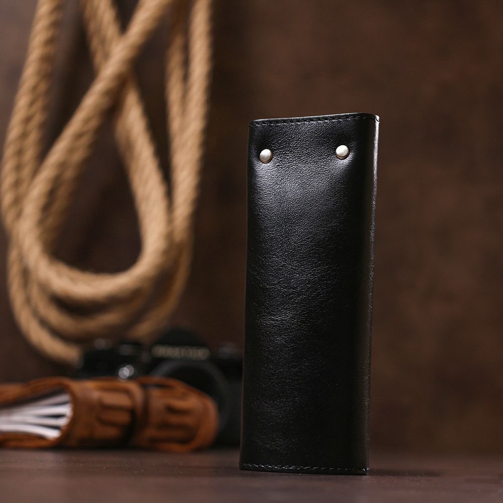 Stylish leather key holder Shvigel 16529 Black